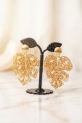 Aretes artesanales flor tejidos en alambre gold filled nacional hechos a mano