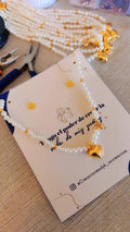 Collar corazón de perlas con dije rodio dorado