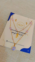 Collar doble lila acero y murano con dije de rodio